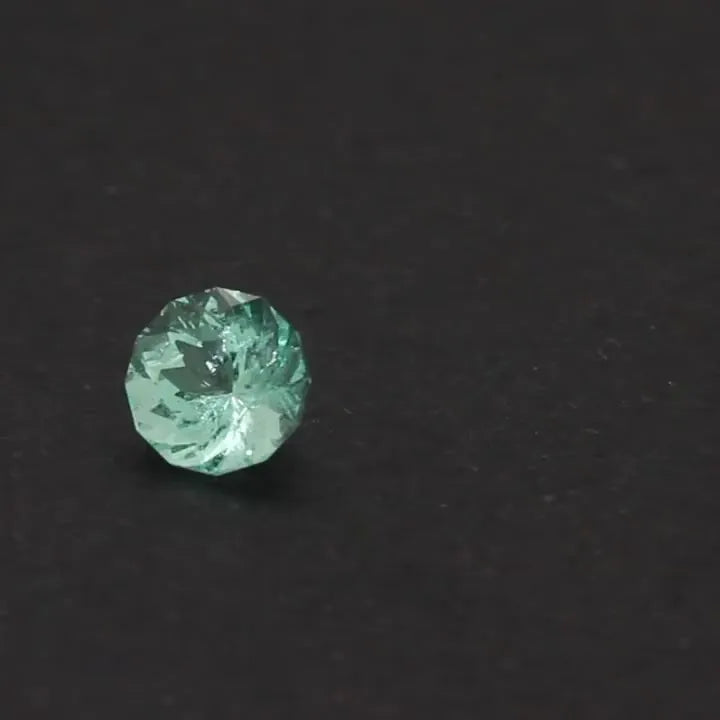 1.25ct Round Natural Emerald (Colour Green, Clarity Slightly Included, Cut Faceted)