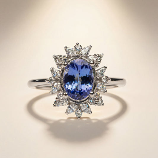 Anello con Tanzanite Naturale 1,10 ct e Diamanti Taglio Round e Navette in Oro Bianco 18 kt